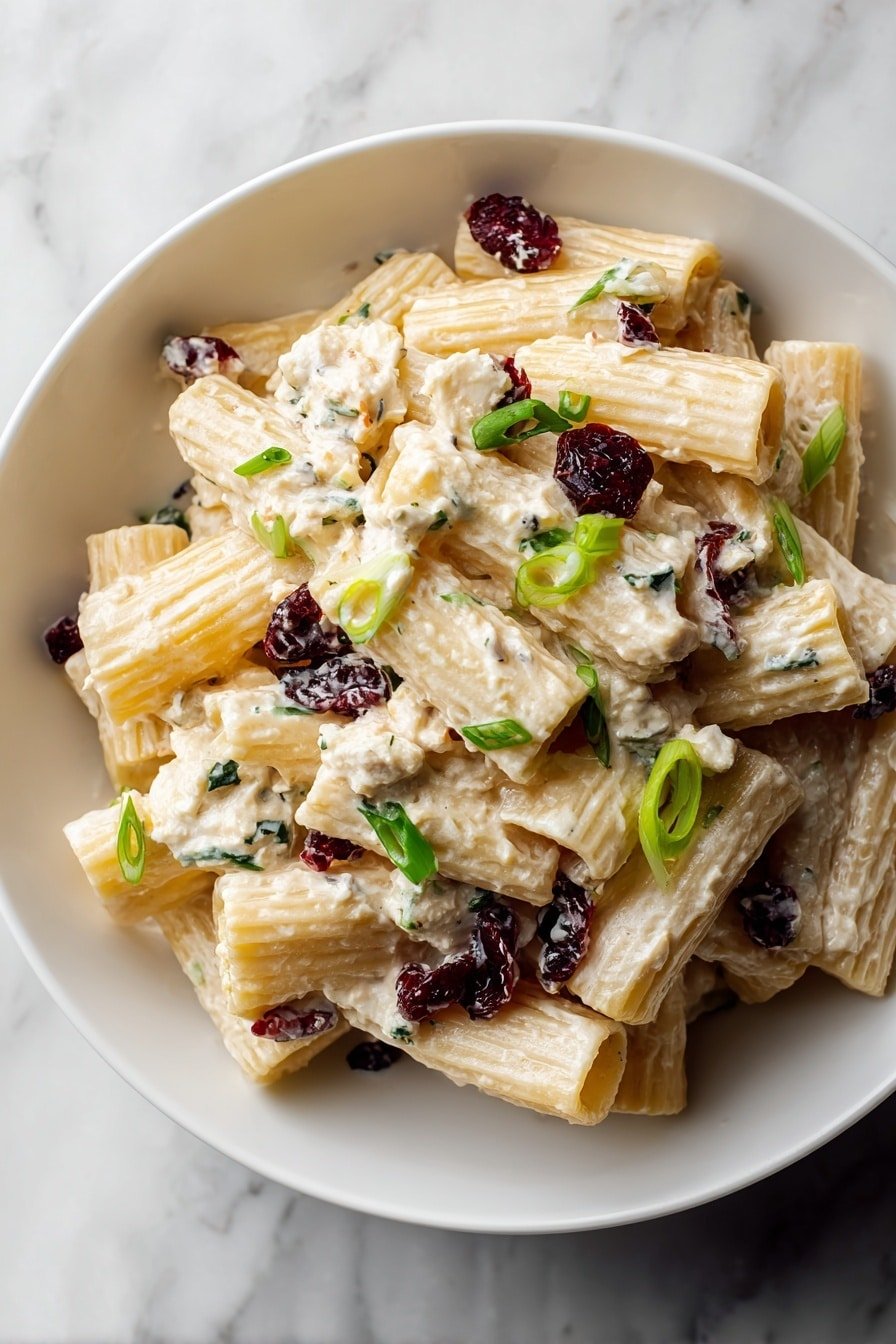 Cranberry Feta Rigatoni Salad Recipe - Article Image 1 — Cranberry Feta Rigatoni Salad, pasta salad with cranberries and feta, easy pasta salad recipes, light and flavorful pasta salad, healthy Rigatoni salad recipes