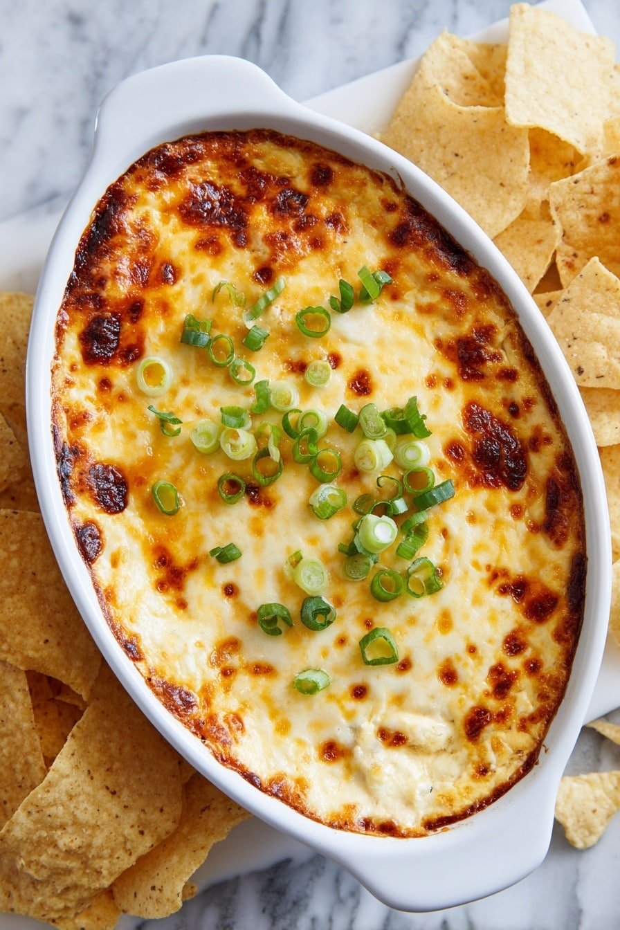 Buffalo Chicken Dip Recipe - Article Image 2 — Buffalo Chicken Dip, easy buffalo chicken dip, cheesy buffalo dip recipe, spicy chicken dip, party appetizers buffalo chicken
