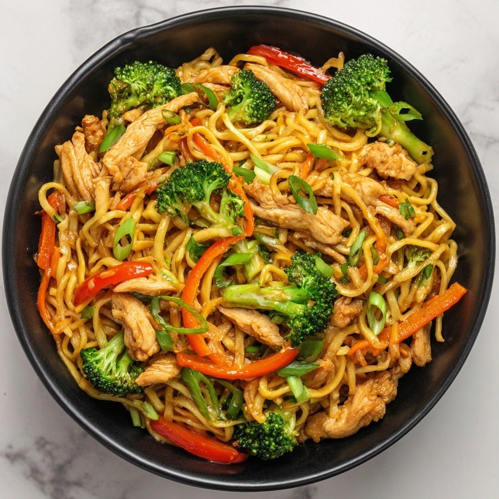 One-Pan Chicken Rice Noodles Recipe - Article Image 1 — One-Pan Chicken Rice Noodles, chicken rice noodles, easy chicken noodle stir-fry, quick weeknight dinner, comforting Asian noodle dish