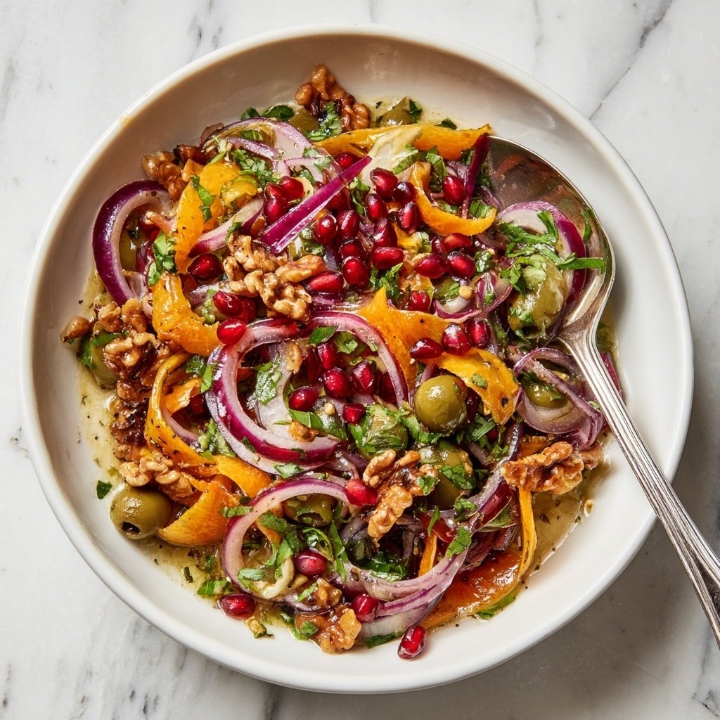 Olive and Pomegranate Salad Recipe - Article Image 1 — Olive and Pomegranate Salad, Mediterranean salad, healthy fruit and vegetable salad, easy summer salad, vibrant vegetable side dish