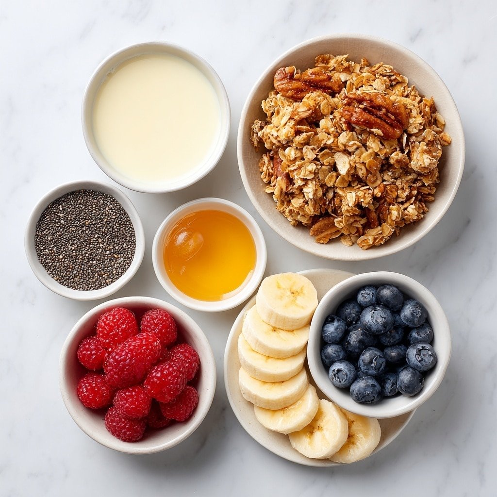 Flat lay of a small mound of glossy black chia seeds in a simple white ceramic bowl, a small white bowl filled with smooth almond milk, a small white bowl holding golden honey, a small white bowl with clear vanilla extract, one medium ripe banana sliced into neat rounds arranged on a white ceramic plate, a small white bowl overflowing with crunchy oat-based granola with visible cinnamon bits and nuts, a small white bowl containing a handful of fresh mixed berries including blueberries and raspberries, all perfectly spaced and symmetrically arranged, placed on a clean white marble surface, soft natural light, photo taken with an iPhone, professional food photography style, fresh ingredients, white ceramic bowls, no bottles, no duplicates, no utensils, no packaging --ar 1:1 --v 7 --p m7354639359234015250 — Healthy Chia Pudding with Banana and Granola, chia pudding healthy breakfast, easy chia seed pudding, nutritious fruit and granola bowl, wholesome overnight chia pudding