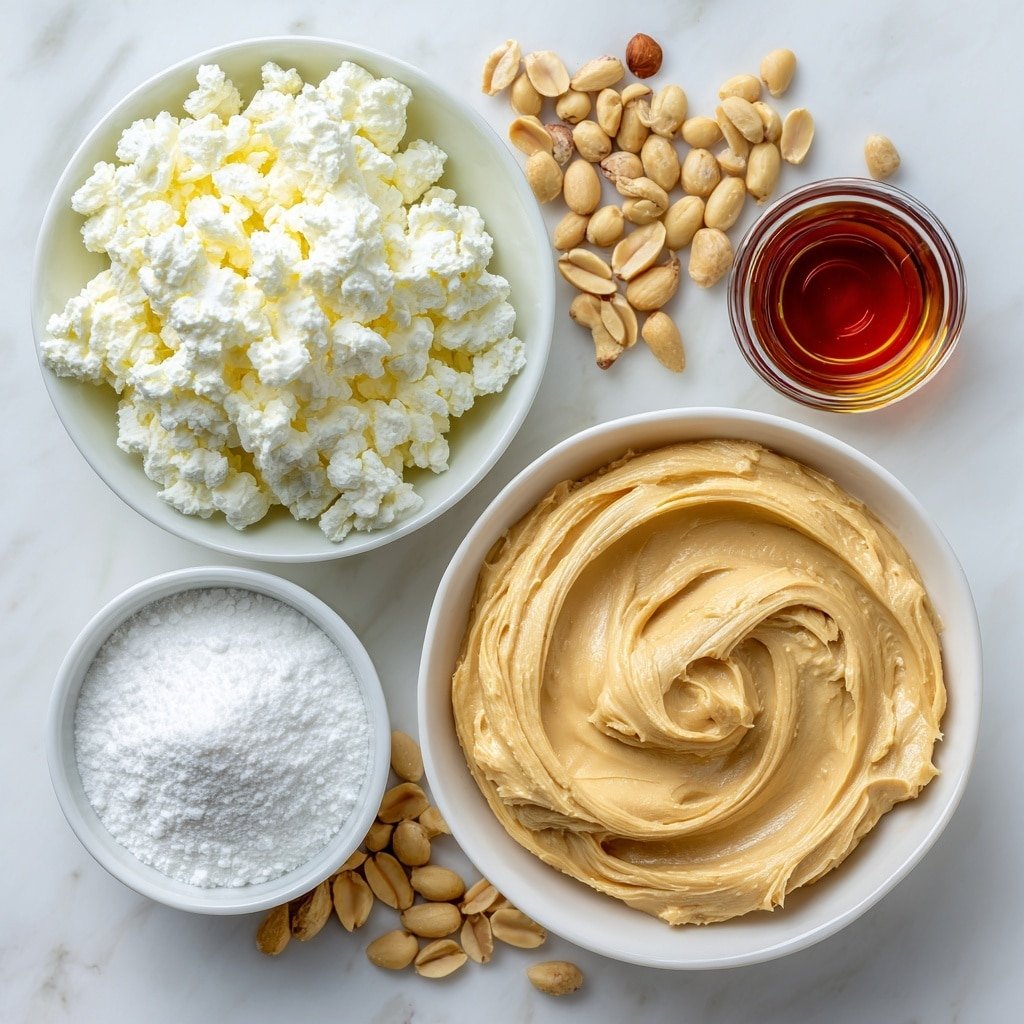 Creamy Peanut Butter Mousse with Crunchy Peanuts Recipe - Ingredients Image — Creamy Peanut Butter Mousse, peanut butter mousse with crunchy peanuts, easy peanut mousse dessert, creamy peanut butter treat, no-bake peanut mousse recipe