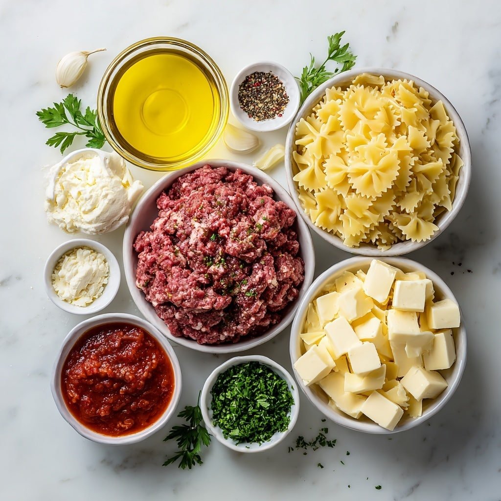 Creamy Velveeta Beef Bowtie Pasta Recipe - Ingredients Image — Creamy Velveeta Beef Bowtie Pasta, cheesy beef pasta recipe, easy creamy pasta dinner, comfort food Bowtie pasta, hearty beef and cheese pasta