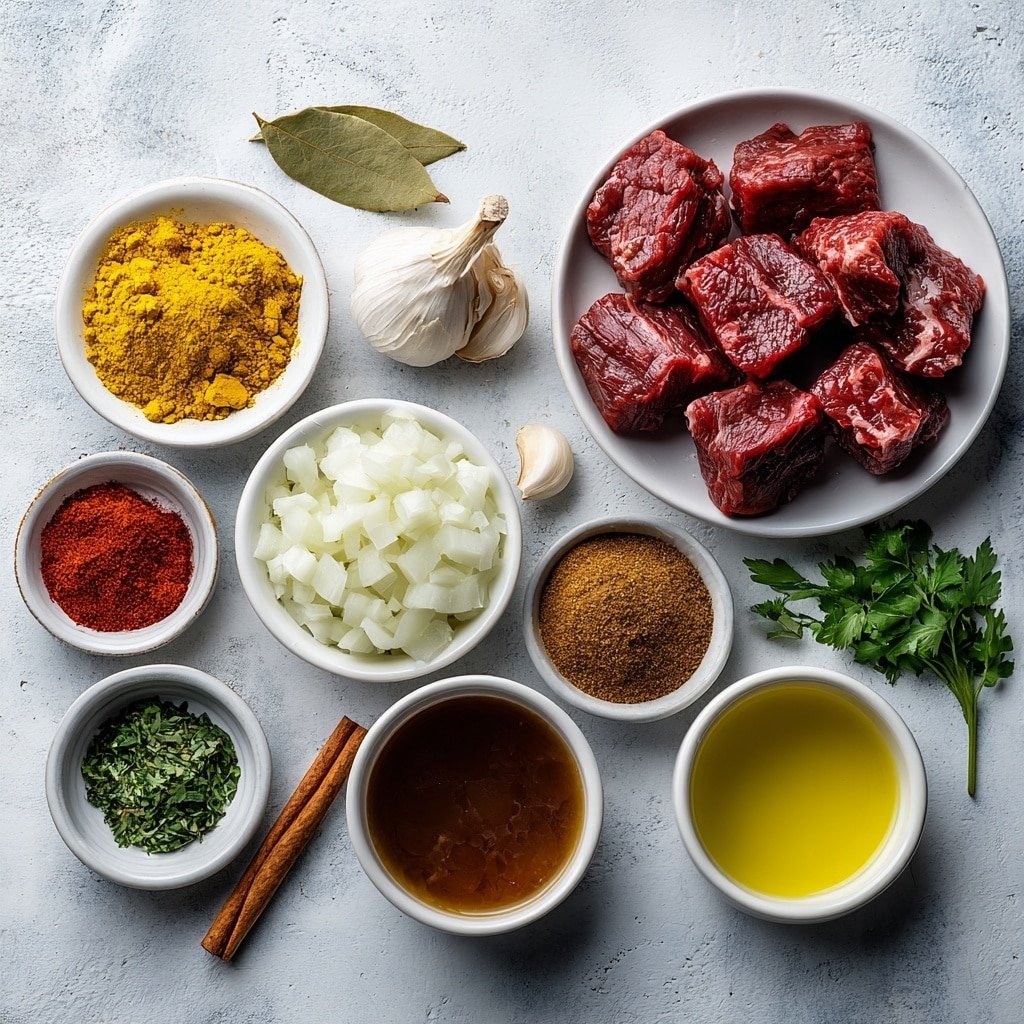 Flat lay of a small white ceramic bowl with golden vegetable oil, several chunks of raw chuck beef, a white ceramic bowl filled with chopped white onions, two whole garlic cloves, a small piece of fresh ginger root, a white ceramic bowl containing vibrant yellow ground turmeric, a white ceramic bowl with warm brown ground coriander, a white ceramic bowl of deep brown garam masala, a white ceramic bowl with finely ground cumin, a white ceramic bowl holding bright red chili powder, a small white ceramic bowl with rich brown beef broth, a small white ceramic bowl of clear water, a single cinnamon stick, one dried bay leaf, a small pile of fresh green chopped cilantro, a pinch of coarse salt in a small white bowl, all arranged in perfect symmetry, placed on a clean white marble surface, soft natural light, photo taken with an iPhone, professional food photography style, fresh ingredients, white ceramic bowls, no bottles, no duplicates, no utensils, no packaging --ar 1:1 --v 7 --p m7354639359234015250 — Indian Beef Curry, Indian Beef Curry Recipe, how to make Indian Beef Curry, easy Indian Beef Curry, flavorful beef curry dishes
