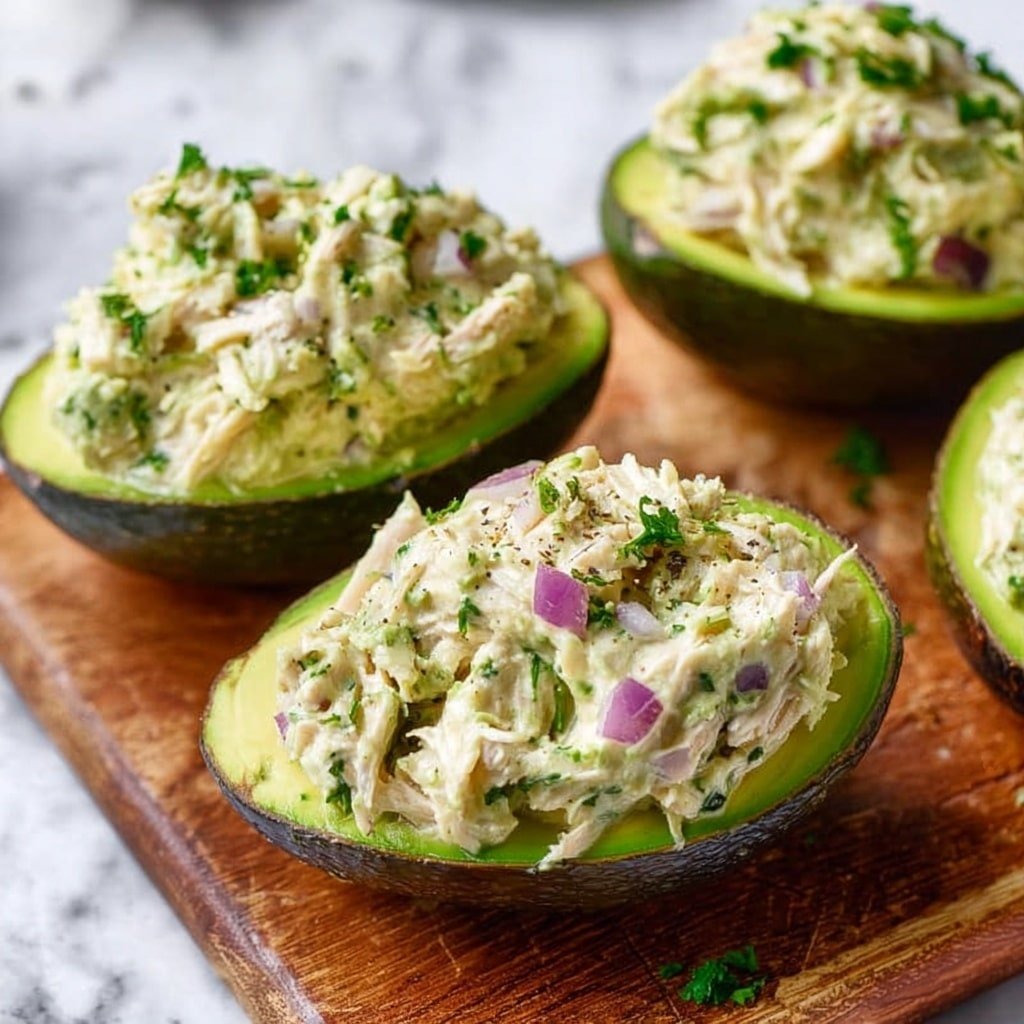 Chicken Salad Stuffed Avocado Recipe - Article Image 2 — Chicken Salad Stuffed Avocado, healthy avocado chicken salad, easy stuffed avocado recipe, nutritious lunch ideas, quick chicken salad recipes