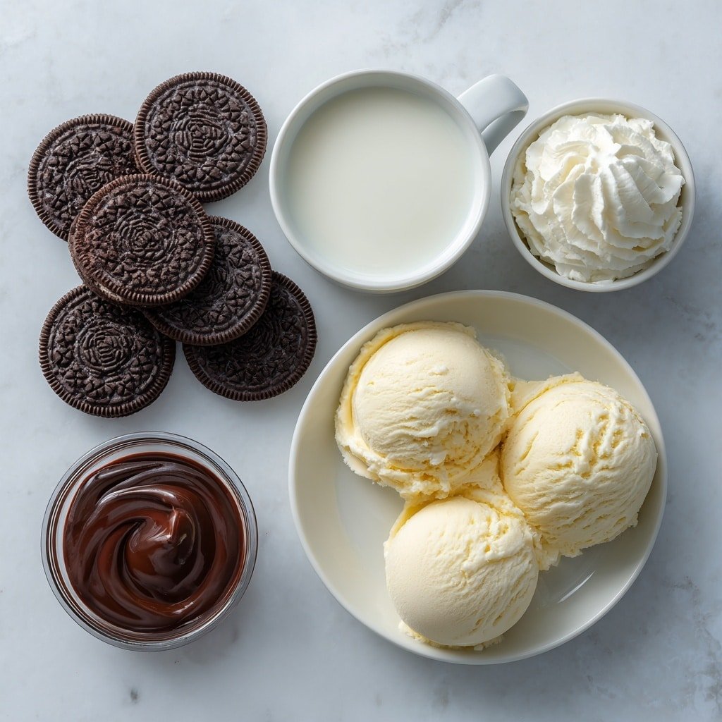 Flat lay of six whole Oreo cookies arranged neatly, a small white ceramic bowl of fresh cold milk, two scoops of creamy vanilla ice cream placed side by side on a simple white plate, a small white bowl filled with fluffy whipped cream, and a small white bowl containing thick chocolate syrup, all ingredients fresh and natural, perfectly balanced and symmetrical, placed on a clean white marble surface, soft natural light, photo taken with an iPhone, professional food photography style, fresh ingredients, white ceramic bowls, no bottles, no duplicates, no utensils, no packaging --ar 1:1 --v 7 --p m7354639359234015250 — Oreo Milkshake, Oreo Milkshake Recipe, Creamy Oreo Shake, Easy Oreo Milkshake, Chocolate Cookie Shake